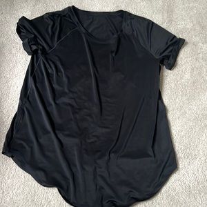 Lululemon black open back t-shirt. Size 4